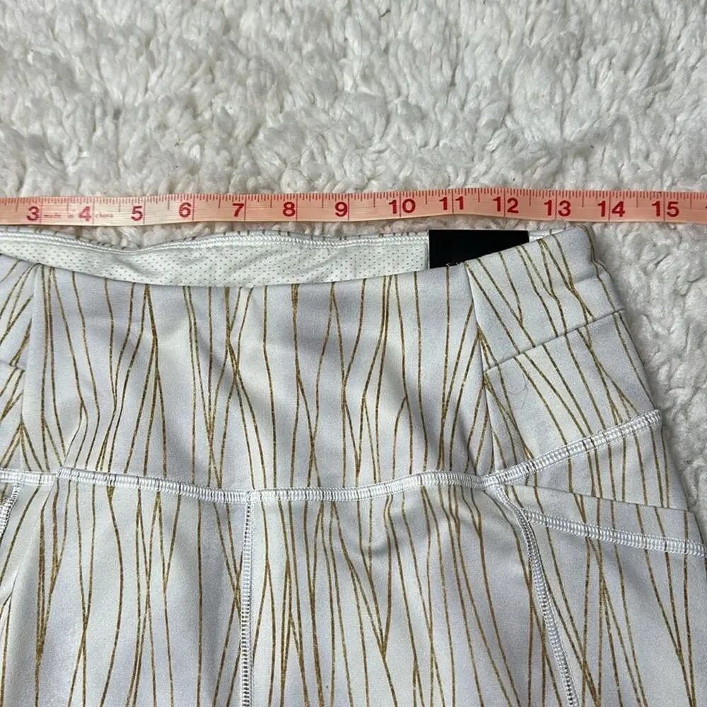 CALIA by Carrie Underwood White and Gold Leggings Warm Collection Pockets Ankle